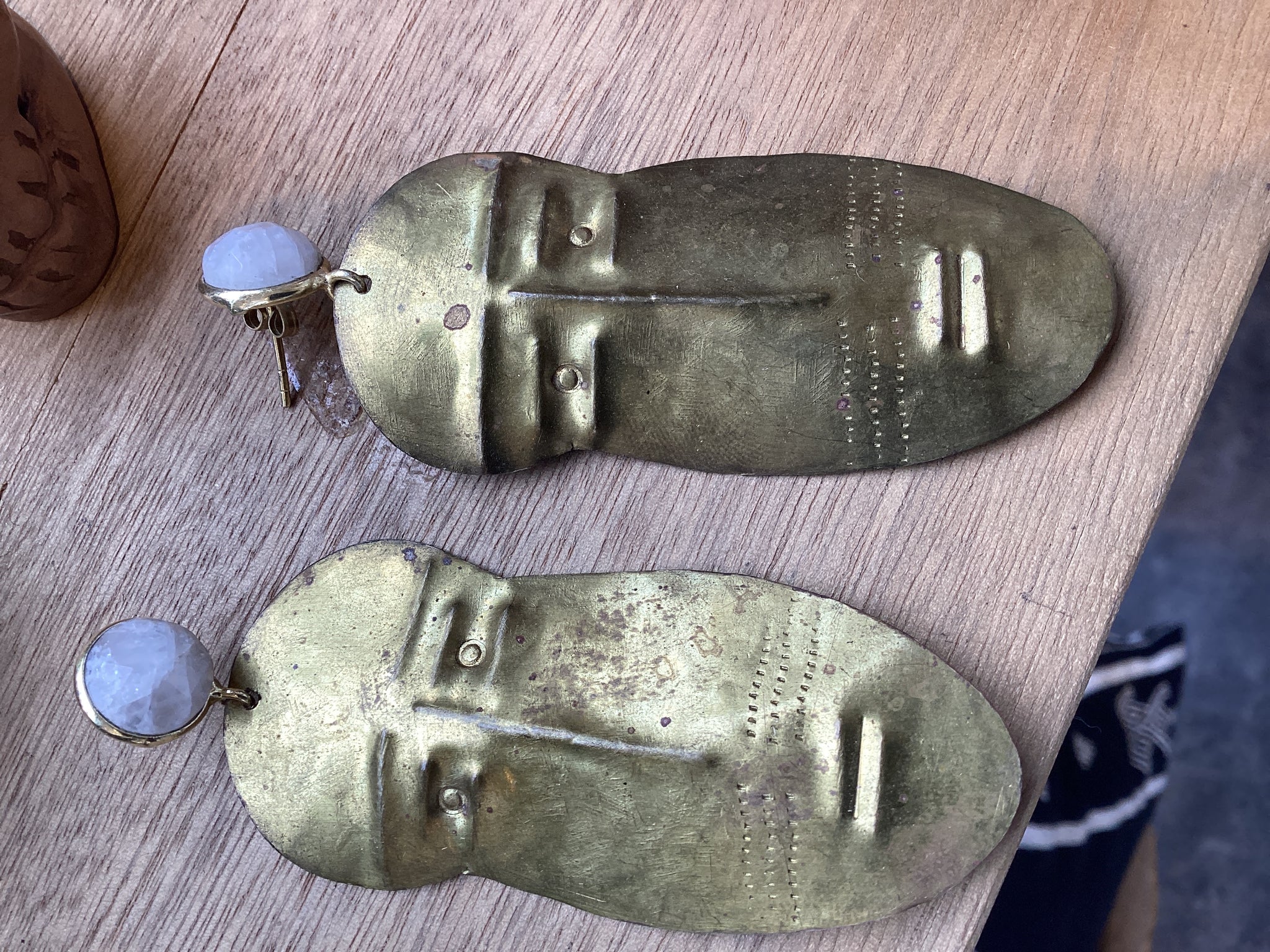 Aretes cara de bronce